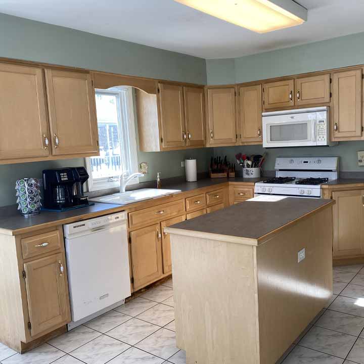 Before - Brown 70s style kitchen cabinets